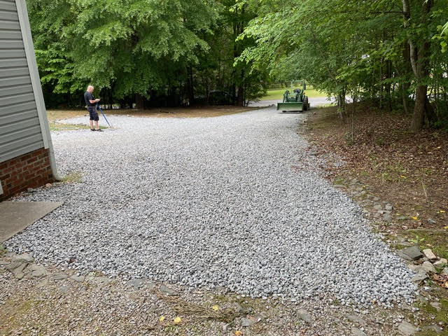 Fresh gravel driveway and parking pad